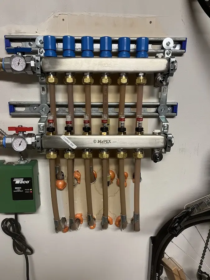 Plumber performing Water Heater Repair at a residential property in Kent